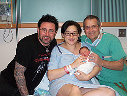 Dad, Mom, baby and Dr Gary Blake